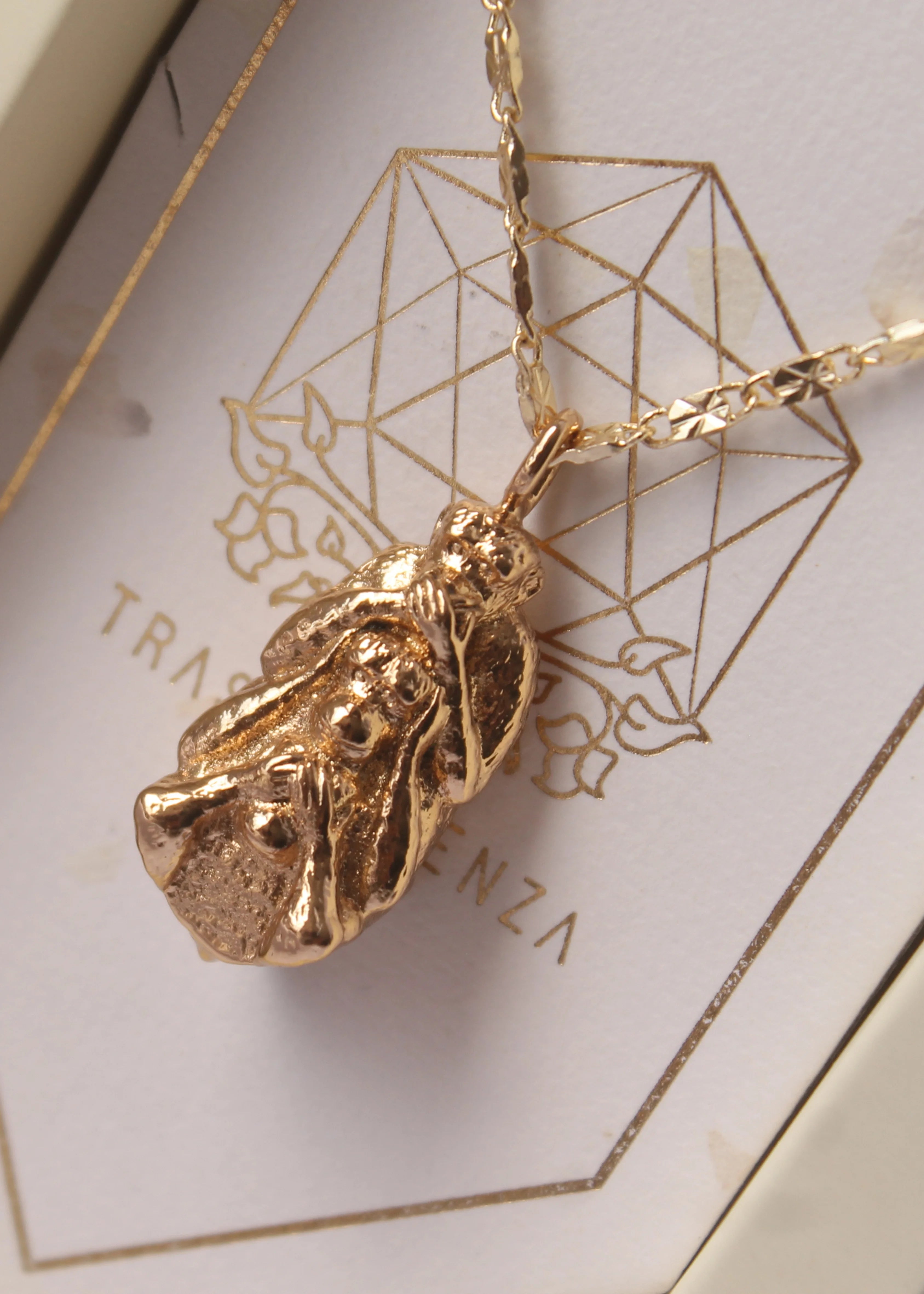 Collar Monos Tótem Coherencia